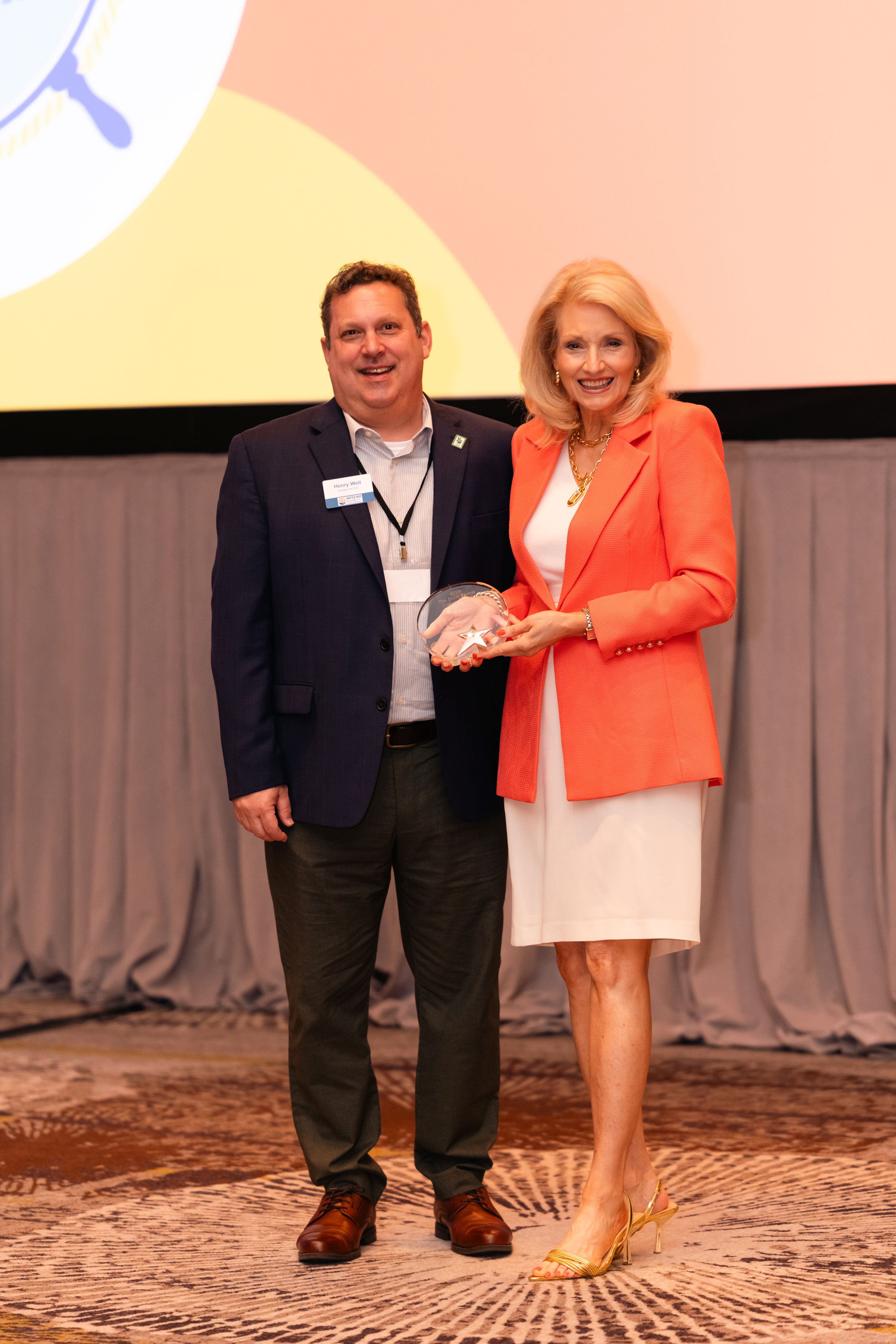 Dolly Parton Award Recipient Missy Santorum posing with Henry Well of United Way Association of SC