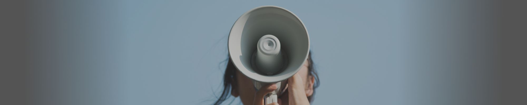 person holding a megaphone