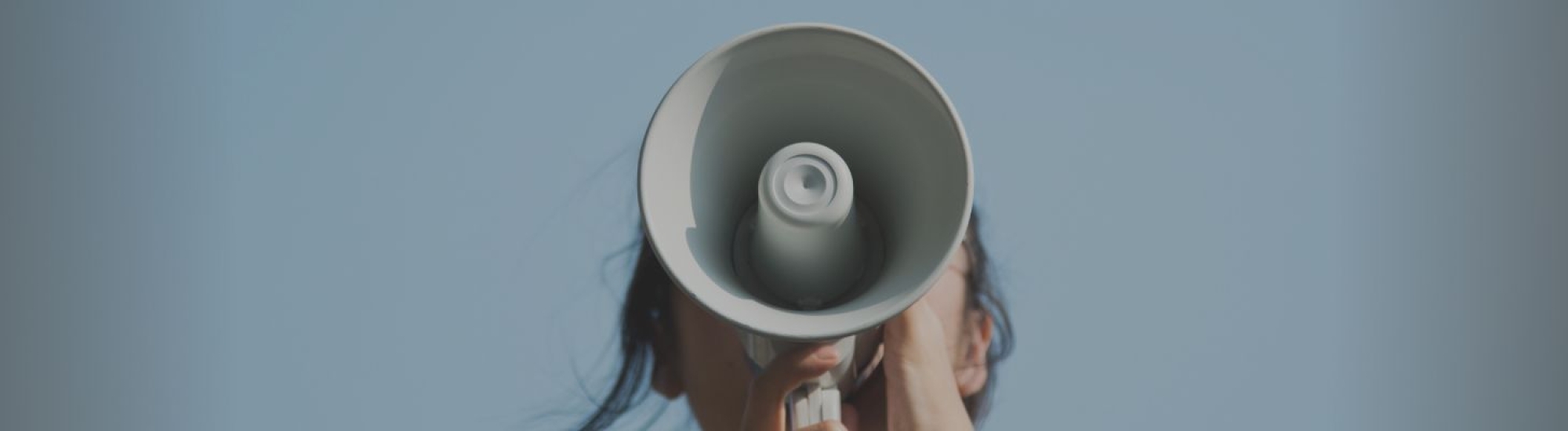 person holding a megaphone